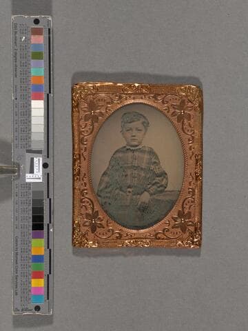 Portrait of a girl wearing plaid dress [Thoreau - Sewall families?]