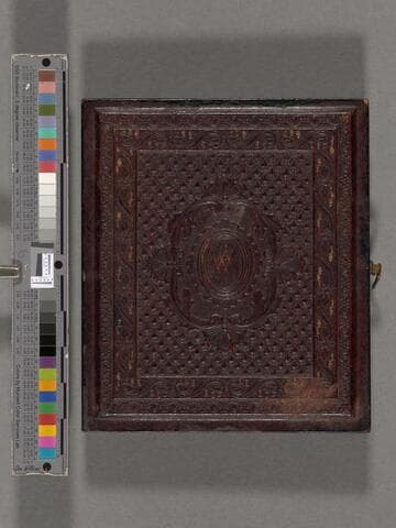 Portrait of unidentified man and woman seated side-by-side