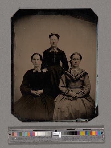 Three unidentified women with hand-colored cheeks
