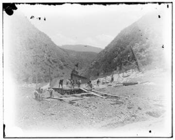 A construction crew finishing the foundations for Mill Creek #3 Hydro Plant