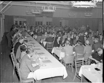 People seated at a large banquet