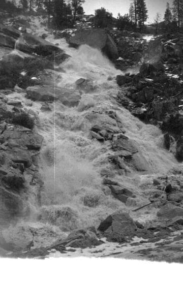 Big Creek - Mammoth Pool - undocumented shot of water flowing down a slope with project related construction shots