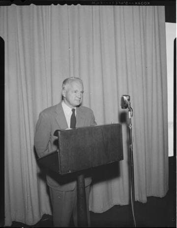 Speaker at podium and a chef cooking in a kitchen