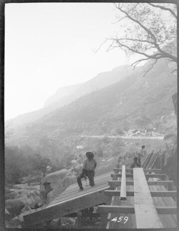 A construction crew working on the flume and spillway at Tule Plant