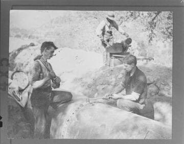 A construction crew riveting the pipeline at Kaweah #1 Hydro Plant