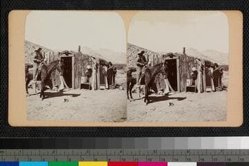 Hualapai Indian on horse and two Hualapai women next to house