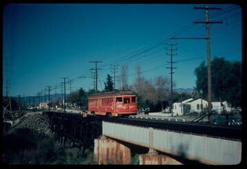 Pacific Electric Railway car on trestle past Rio Vista station on the Van Nuys line