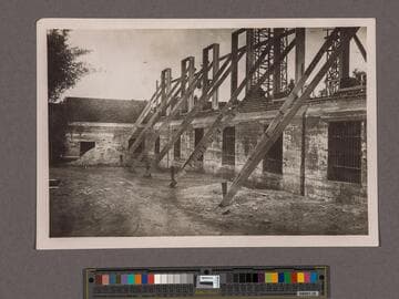 Huntington Library Construction: view showing east side of the East Wing brickwork and window frames, looking south