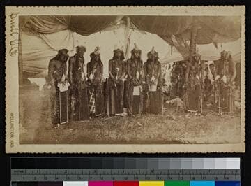 An Arapahoe fraternity in dancing dress. Fort Reno, 1886