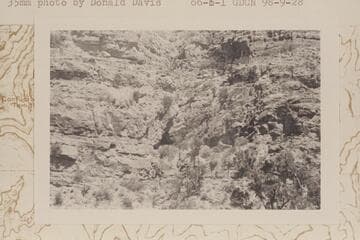 Entrance to Olla Vieja Cave below and left of center looking across the draw from point above Redwall climb