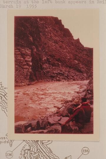 Down to the lower drop in Bridge Canyon Rapid, Mile 235.2.  Buzz and Bill Belknap at lower right