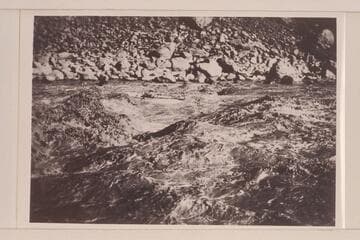 Frank Dodge in Hermit Creek Rapid.  Cruise of the Carnegie Institution-Caltech party