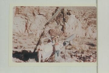 Red Carson, pilot, and his passenger Ed Hudson at the wreck of the Hillercopter on the Tonto Platform