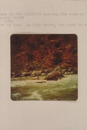 Lug Larsen in the "Galloway" passing the rock at lower end of Disaster Rapid