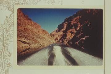 Down from Mile 236.5 at approximately the dam site which is on the Profile