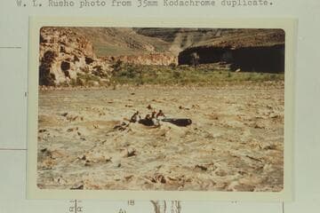 George Stewart's 10-man clears the heavy water in Coal Creek Rapid after filling and drowning the motor in a hole to right of the planned course