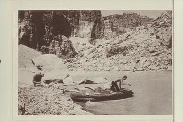Southwest Explorations crew in Cataract Canyon.  Mile 202 1/2.  Left is William R. Dickinson, Santa Barbara.  Right:  Jon Morrow Lindbergh, Darien, Connecticut.  From a print owned by Kent Ross