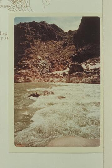Across the head of the second drop in Gneiss Canyon Rapid after the flow through Glen Canyon Dam had been reduced to 1,000 cfs