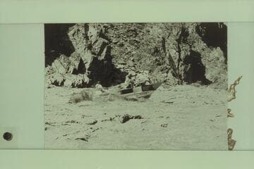 Jim-Bob Rowland at the wheel; Dock Marston piloting the deck boat through Crystal Rapid
