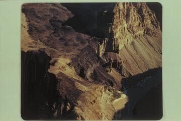 Lava flow to the river from Queantoweap or Hurrican Ledge Valley.  The road and the trail can be seen on the lava