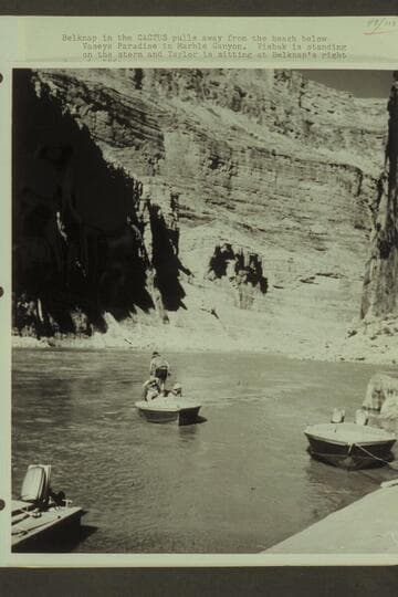 Belknap in the "Cactus" pulls away from the beach below  Vasey's Paradise in Marble Canyon.  Visbak is standing on the stern and Taylor is sitting at Balknap's right