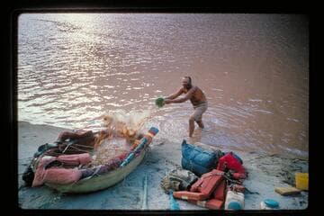 Belknap fills a boat to settle water; Diamond Creek