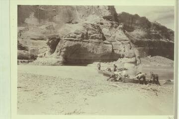RB-MV Expedition at mouth of Warm Creek--Glen Canyon.  Photo 707.  Mile 27.8.  The boats are the 10-ft. Fold-Flat type