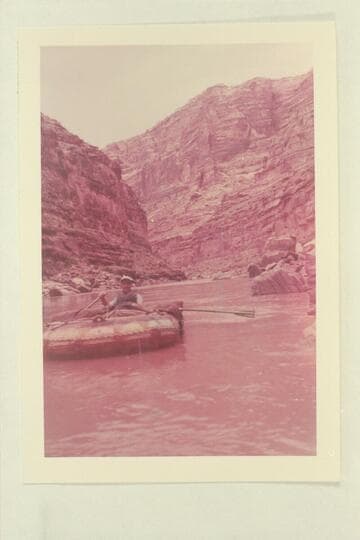 Bill Davis and his 7-man rubber boat.  Mile 180 1/2 end of rapids of any size