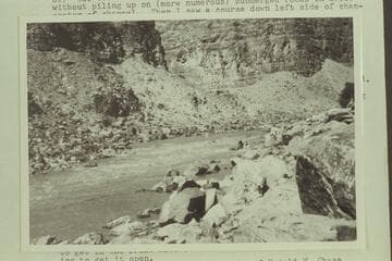 U. S. Geological Survey sadirons pinned to rock in Cataract Canyon