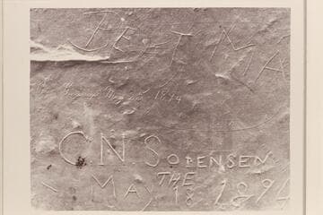 Inscription on huge rock in high cave west of Schock Trail, near Mile 111, north bank.  The Schock Trail was built by Dr. Schock