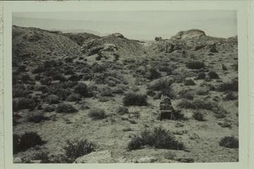 Chimney of old cabin near the name Frency cut on wall of upper end of Robbers Roost Canyon