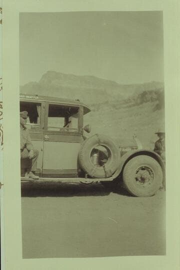 Bus at the dedication of the Marble Canyon Bridge.  Print from the Freeman collection