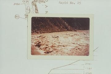 Allan boloney in Rapid No. 22.  The large boulder on the point is The Sliced Boulder