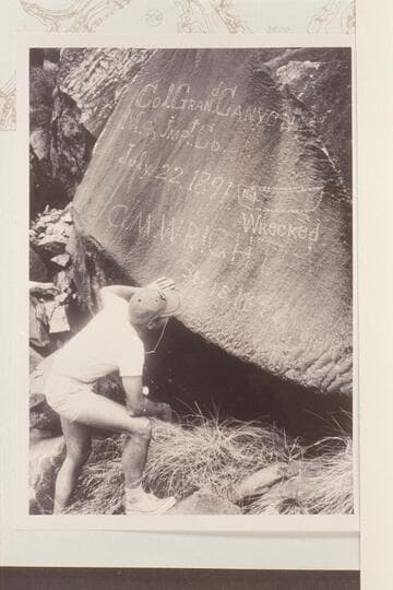 Jorgen Visbak checks the Best expedition and the G. M. Wright inscriptions at Rapid 16