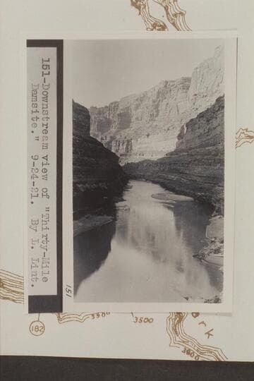 Downstream view of Thirty-Mile Damsite.  CAmera location is Mile 186.4 right bank.  The fan and riffle at center are at the mouth of Cove Canyon at Mile 186.2.  Photo from LaRue album 1