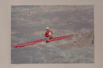 Third day of the cruise from Potash to the Dirty Devil River.  The caption on the back of the print reads:  Day 3  Big Drop  Mile 202-203.  Ty Dines, foreground.  Kenny Moore, left background