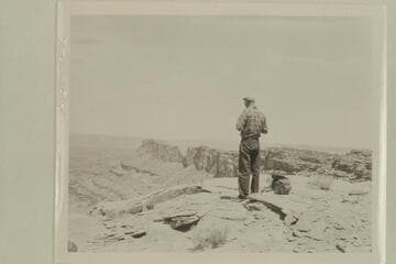 Kent Frost looks off the edge of Glen Canyon north of Monticello