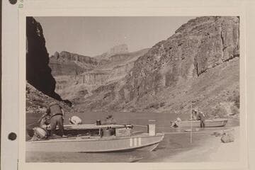 Up-river view from head of Hance Rapid- the three boats of the 1953 outboard run in foreground.  The I. and II. are the 18' craft while the III. is the Twin which made the run in 1951