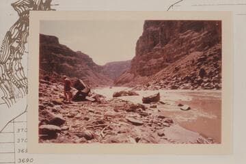 Down to head of Rapid No. 18.  Bill Belknap prepares lunch at left.  Compare Reilly air photo of 9 5 60 showing Up Cataract Canyon from Mile 203.2 to 205.5