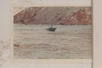 Harris-Brennan boat out of lower end of Rapid 22.  The Sliced Boulder is just ahead of the boat