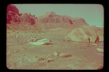 Norm Nevills hung up in Piute Rapid.  MH gauge:  May 1:  1190 cfs.  May 2:  1120 cfs.  May 3:  1080 cfs