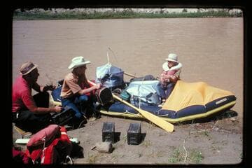 Bud Rusho and his sons prepare to embark at Split Mountain for a cruise to Green River, Utah