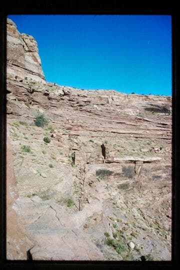 Brimhall climbs trail from Horsethief Canyon