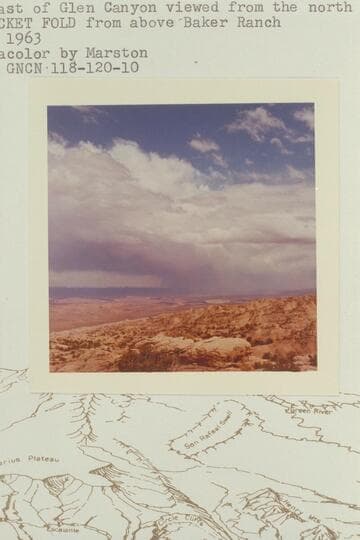 Storm east of glen Canyon viewed from the north slope of Waterpocket fold fromm above Baker Ranch