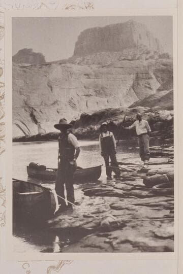 Camp of the Rust-Fraser party at the mouth of Aztec Creek.  Left to right:  Sarah Fraser, Bert Loper and George C. Fraser