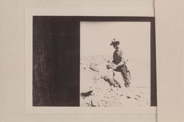 Sampling strata above Lees Ferry camp.  Helper to Ernest Wander, the Assayer