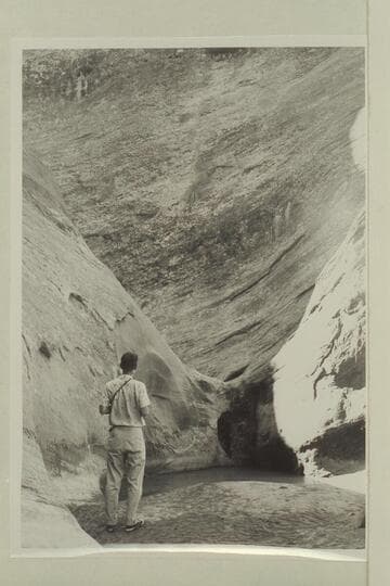 Harvey Butchart looks at drop-off in the northeast fork of 73 near the first landing of the helicopter