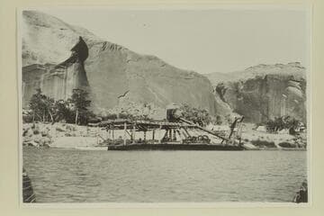 Raising the ladder on Hoskanini dredge, Glen Canyon- Mile 121, Camp Stone