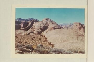 Across head of 73 from Black Brush Mesa.  Butte 6069 is upper left.  Cummings Mesa is on skyline at upper right.  The butte at right is between the northeast and the middle forks