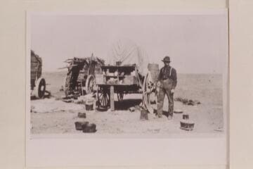 Cook wagon on road to Lees Ferry from Flagstaff.  With the outfit carrying mining supplies to the Spencer placer